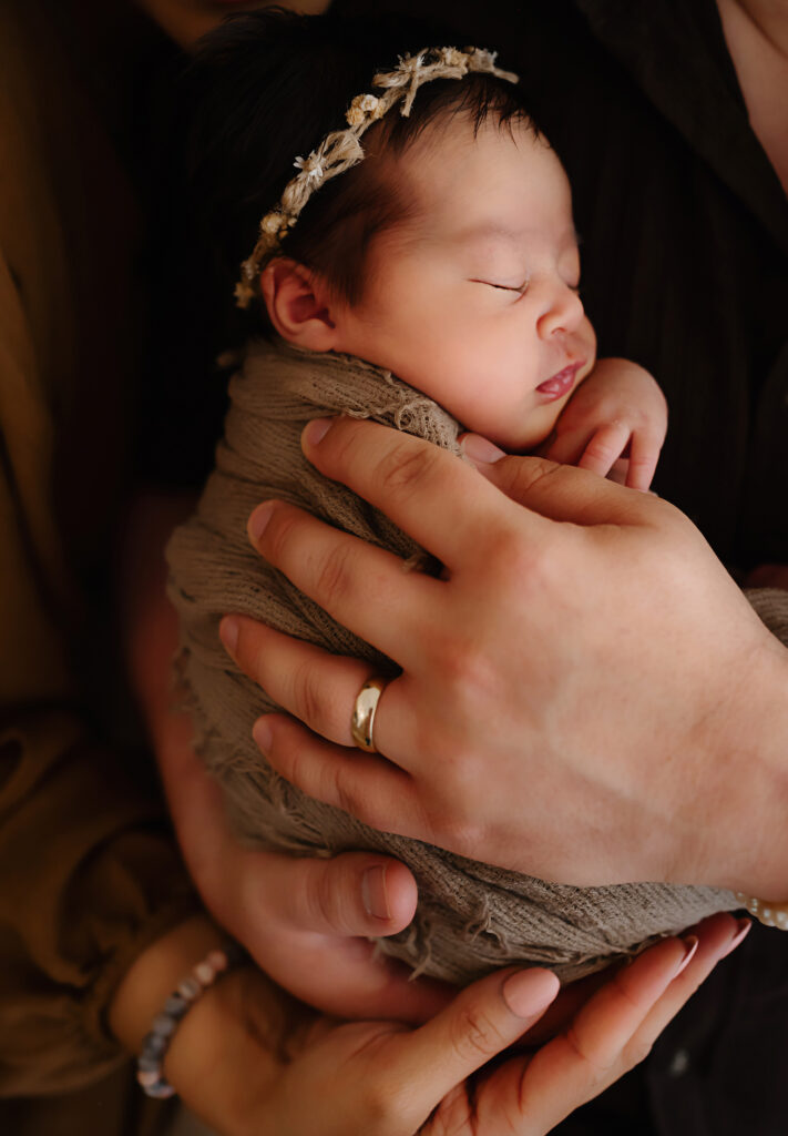 Image of newborn baby wrapped in lace by Fort Worth photographer Paula Goforth 