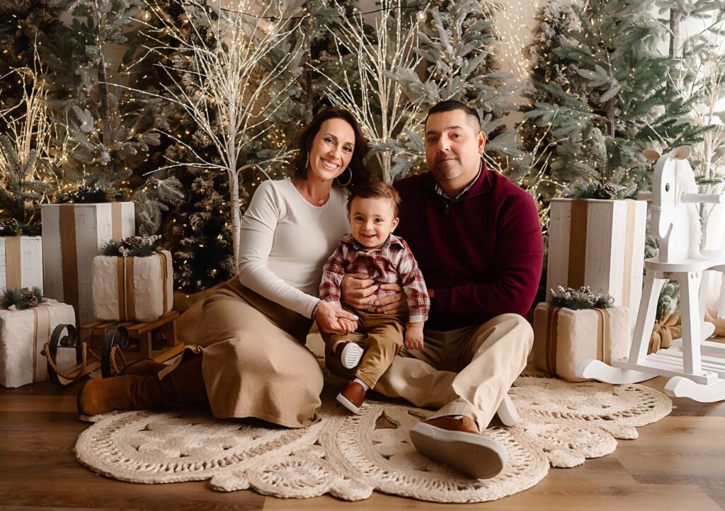 Holiday image of mom, dad, and son by Fort Worth photographer Paula Goforth 