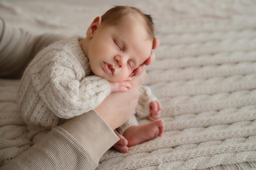 Sweet, snuggled baby image by Fort Worth newborn photographer Paula Goforth