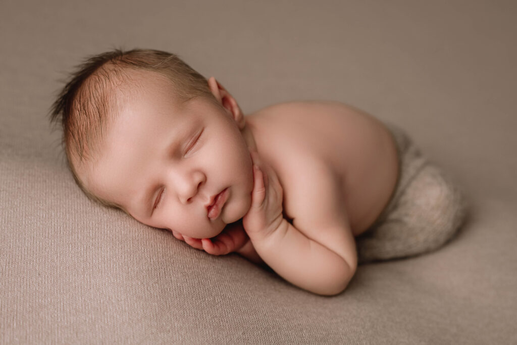 Beautiful newborn photo of swaddled baby by Fort Worth newborn photographer Paula Goforth 