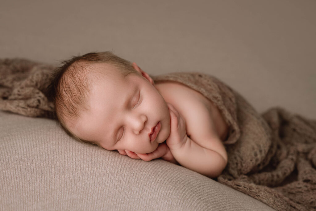 Beautiful newborn photo of swaddled baby by Fort Worth newborn photographer Paula Goforth 