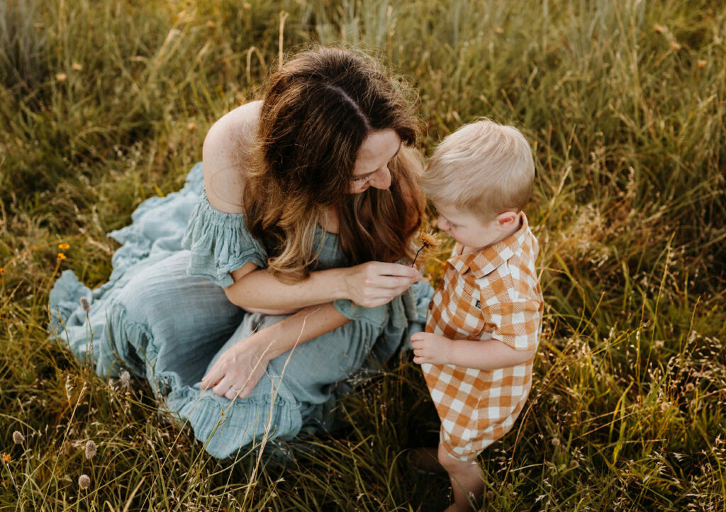 Family in sunlit Texas field during a self-care inspired photo session